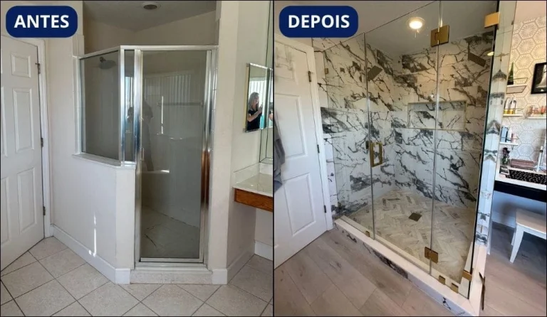 Box de banheiro moderno com vidro temperado, revestimento de mármore e detalhes em dourado, após a reforma.